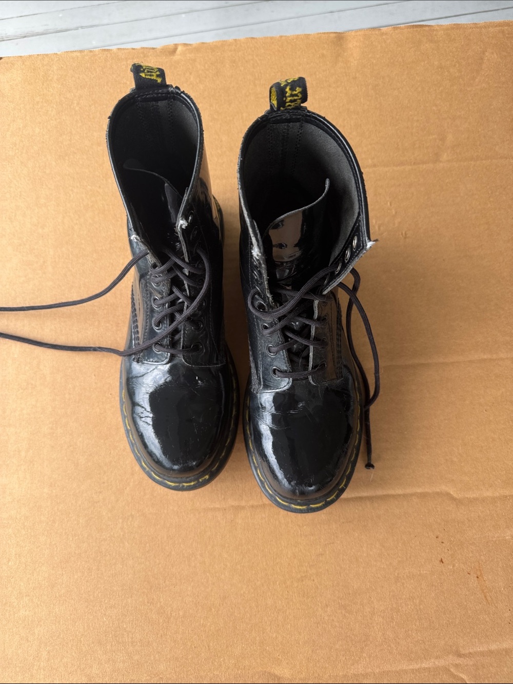 Dr. Martens Black Patent Lace-Up Combat Boots with Yellow Stitching